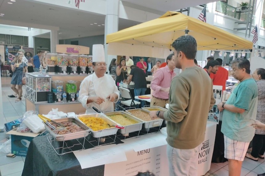 Chef Meraj Ul Haque manning a live kebab and biryani counter abroad